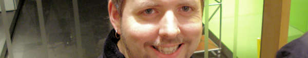 M.